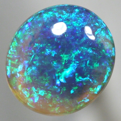 SOLID CRYSTAL OPAL Blue - green Harlequin pattern with greens and blue jumping brightly. With VIDEO